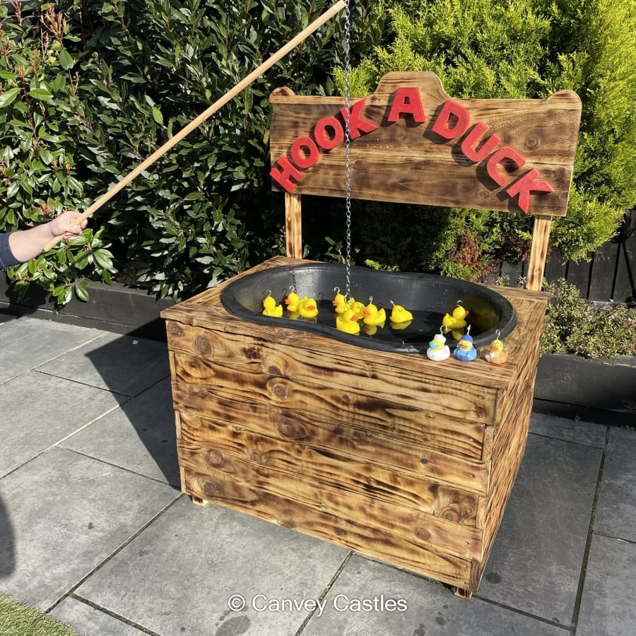 Giant Wooden Hook a Duck Game Best Bouncy Castle Hire service in