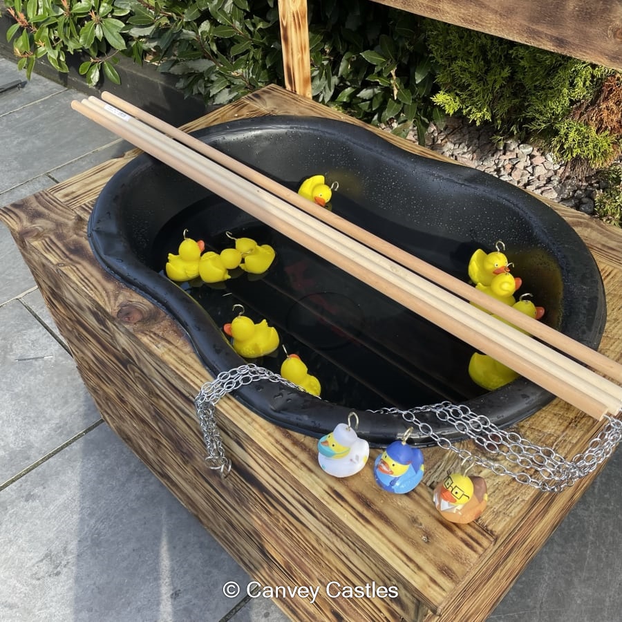 Giant Wooden Hook a Duck Game Bouncy Castle Hire in Essex
