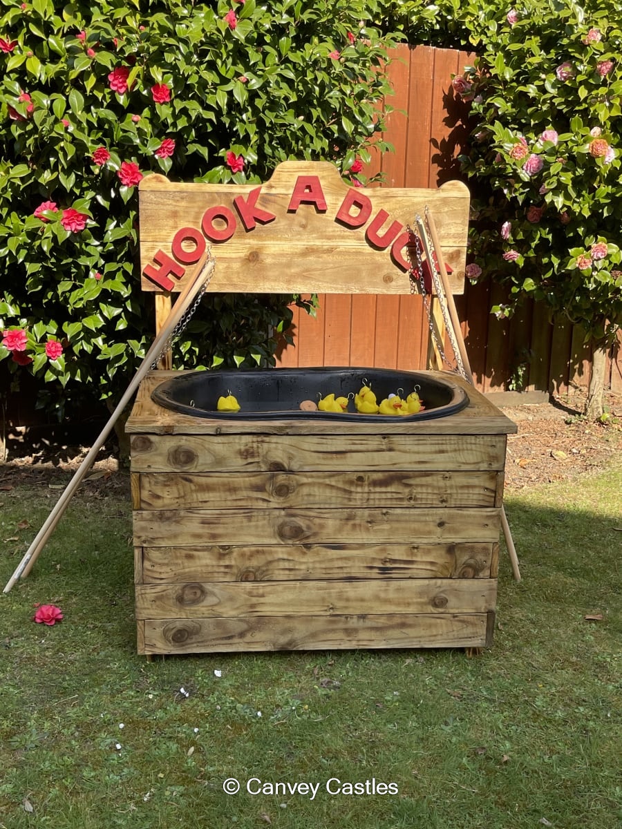 Giant Wooden Hook a Duck Game Best Bouncy Castle Hire service in Essex Canvey Castles