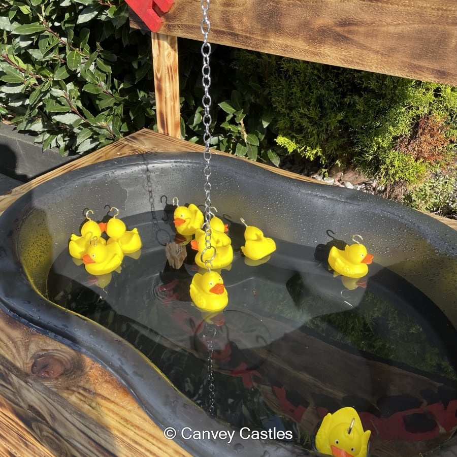 Giant Wooden Hook a Duck Game Best Bouncy Castle Hire service in