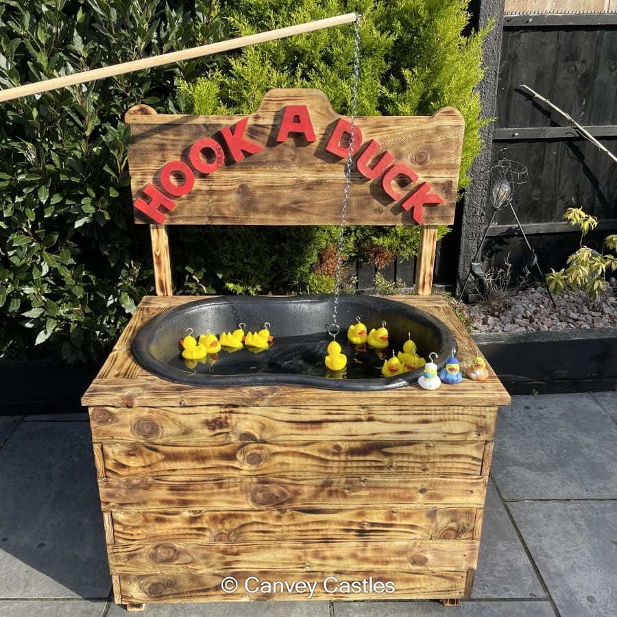 Giant Wooden Hook a Duck Game Bouncy Castle Hire in Essex