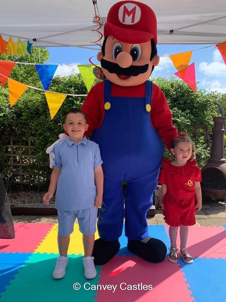 Super Mario Mascot costume Best Bouncy Castle Hire service in Essex